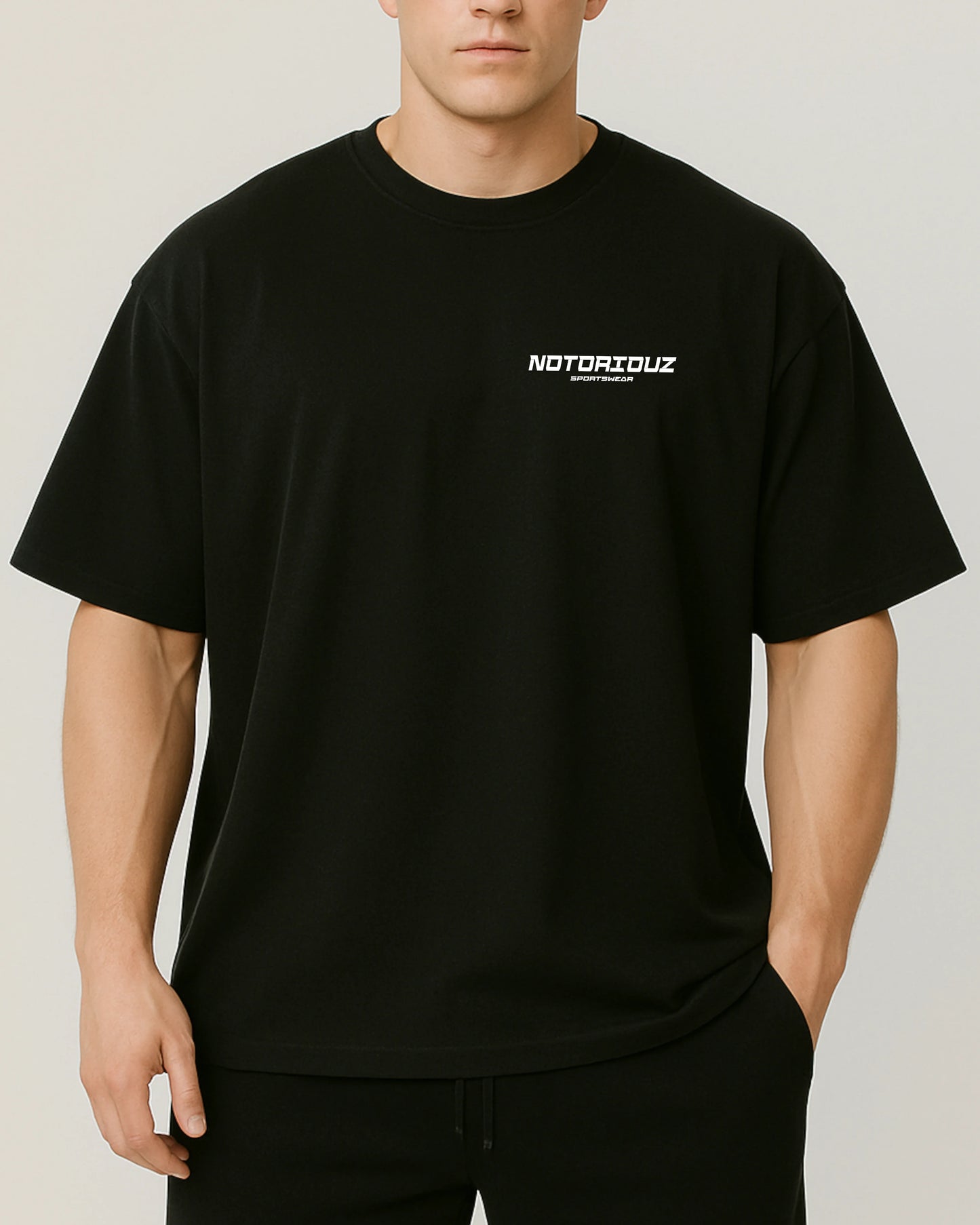 Blood Sweat & Iron Oversize Pumpcover Shirt Vorderseite – schwarzes Gym Shirt mit Notoriouz Sportswear Logo