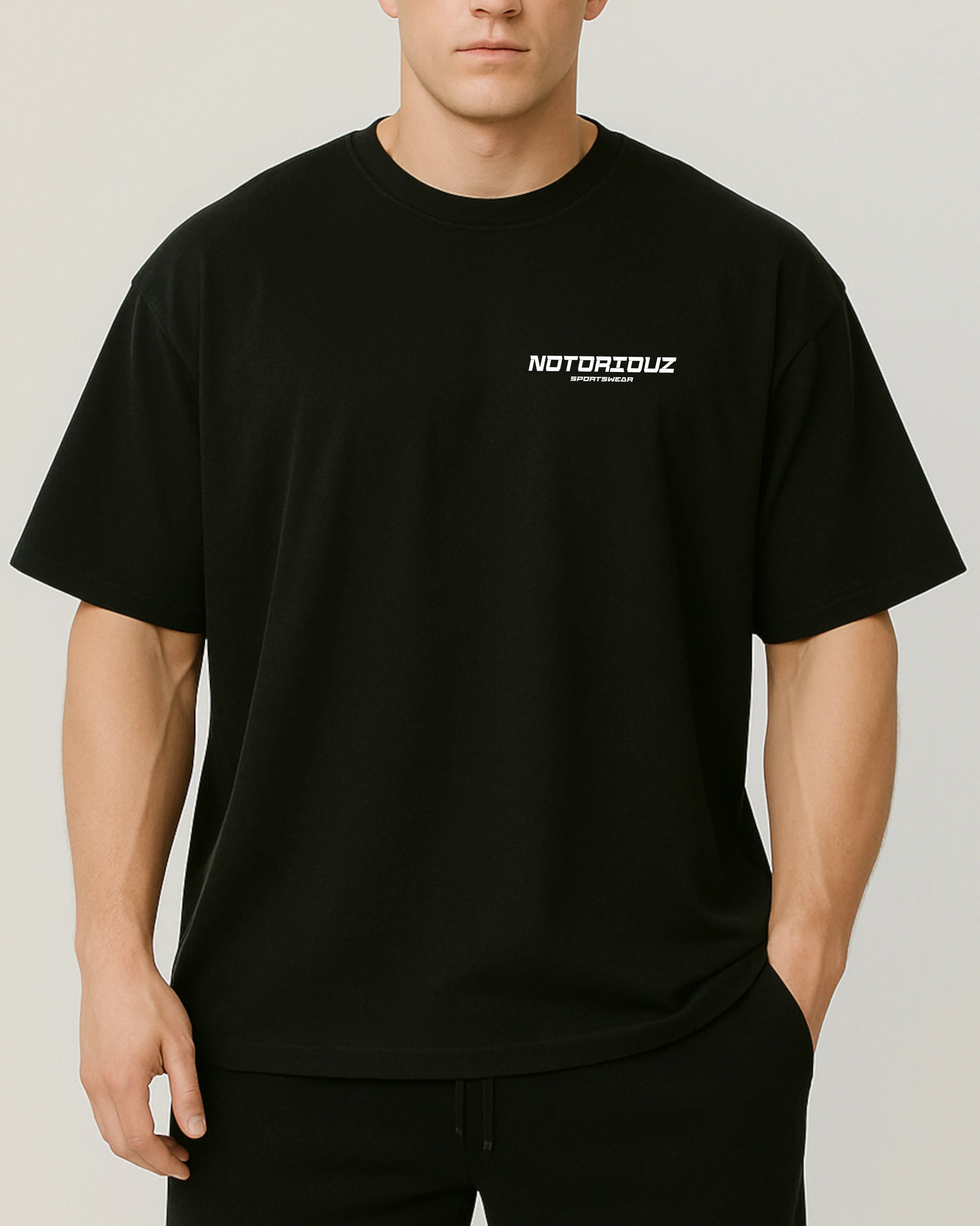 Iron Addict Oversize Pumpcover Shirt Vorderseite – schwarzes Gym Shirt mit Notoriouz Sportswear Logo